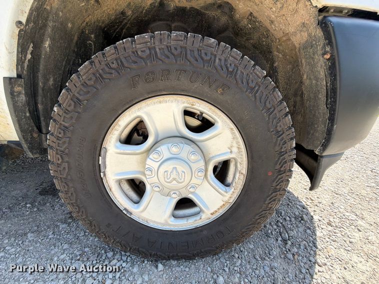 image for item EX2515 2021 RAM 2500 Heavy Duty Crew Cab flatbed pickup truck