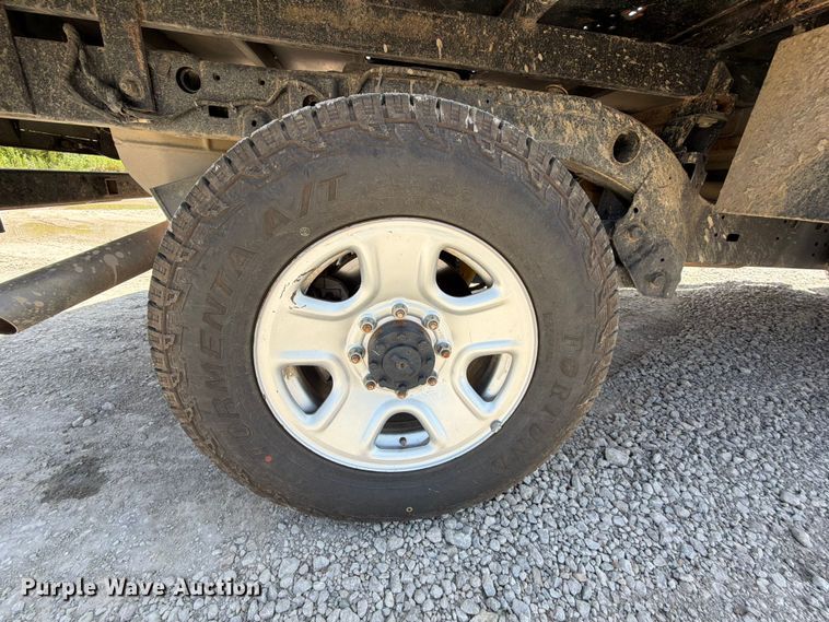 image for item EX2515 2021 RAM 2500 Heavy Duty Crew Cab flatbed pickup truck