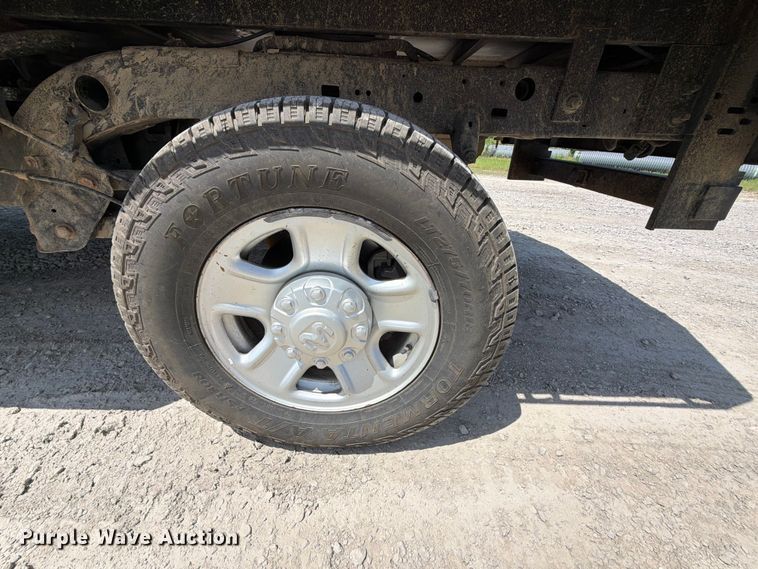 image for item EX2515 2021 RAM 2500 Heavy Duty Crew Cab flatbed pickup truck