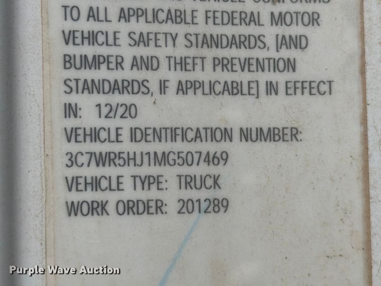 image for item EX2515 2021 RAM 2500 Heavy Duty Crew Cab flatbed pickup truck