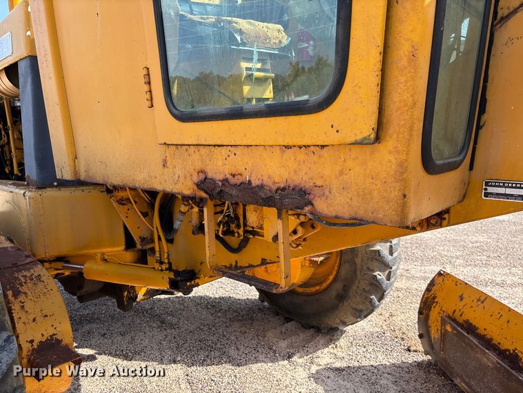 image for item FC1768 1968 John Deere 570 motor grader