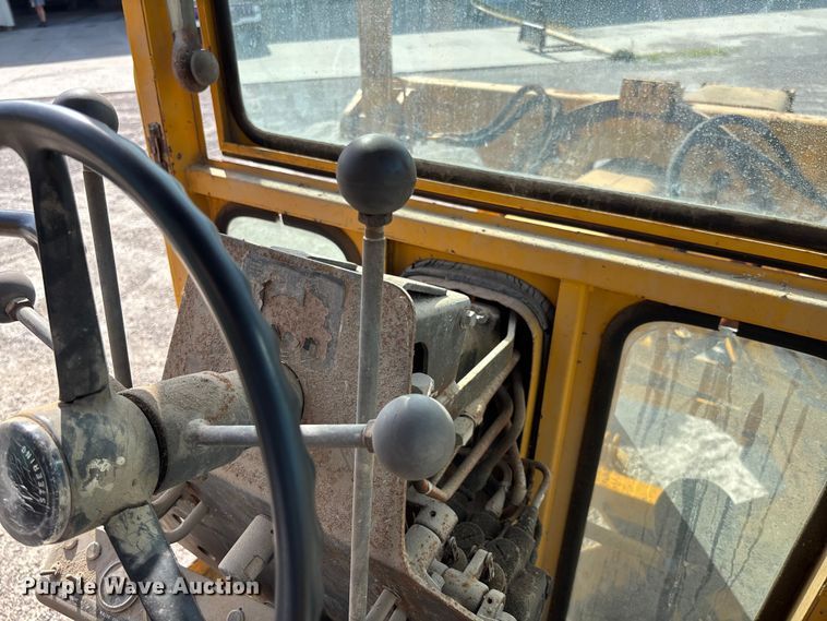 image for item FC1768 1968 John Deere 570 motor grader