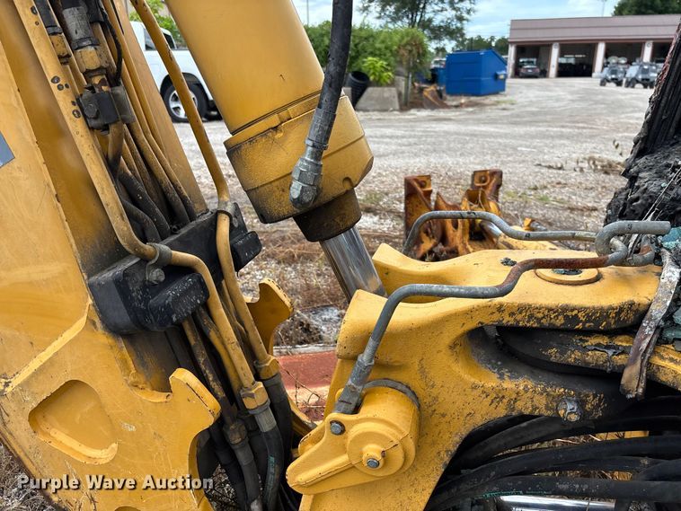 image for item FC1866 2004 John Deere 310SG backhoe