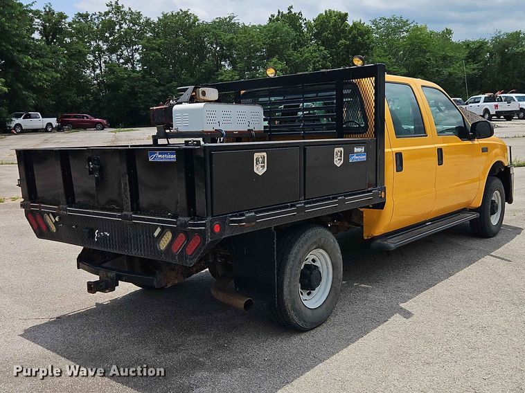 image for item FN5713 2004 Ford F250 Super Duty Crew Cab flatbed pickup truck