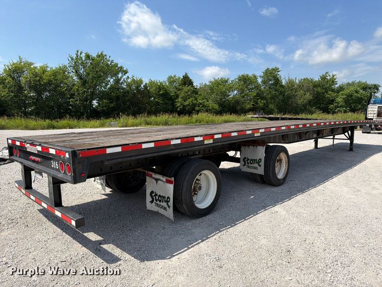 image for item FI0269 2014 Fontaine HCVSF22RSA flatbed trailer