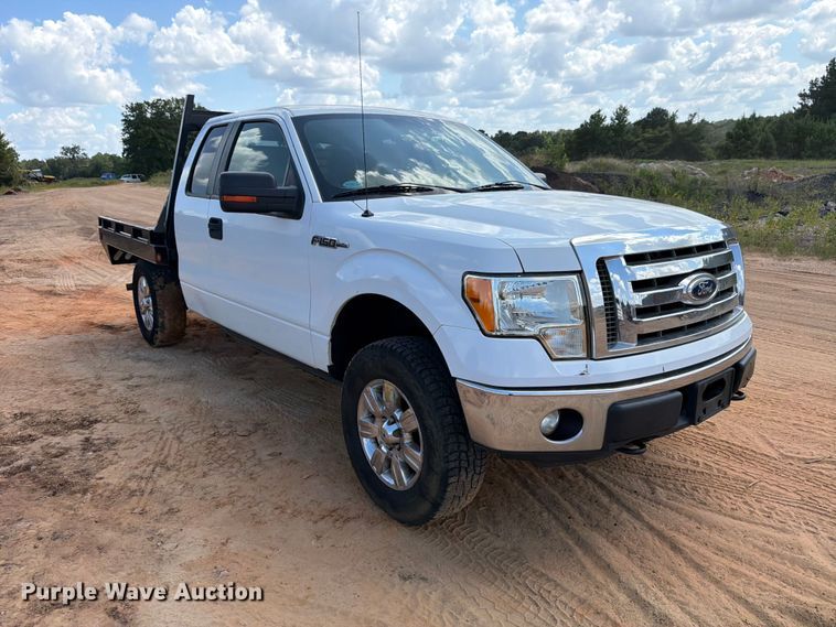 image for item ED5359 2011 Ford F150 Ext. Cab flatbed pickup truck