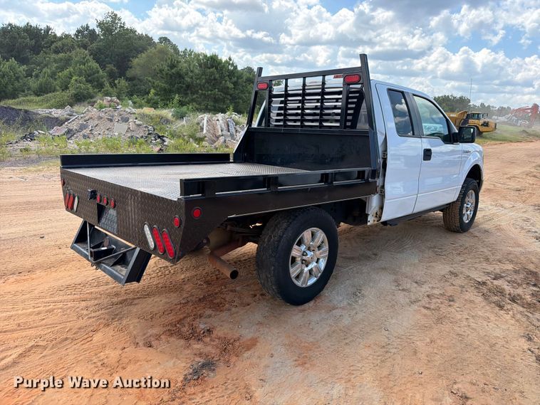 image for item ED5359 2011 Ford F150 Ext. Cab flatbed pickup truck