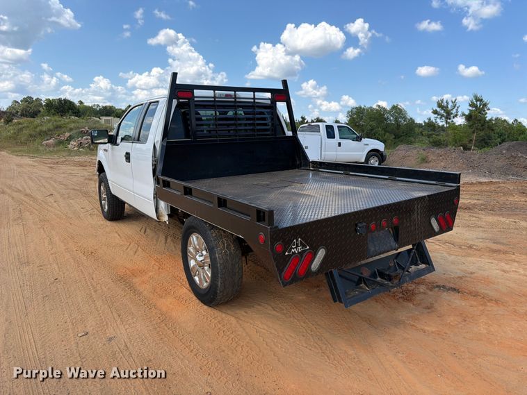 image for item ED5359 2011 Ford F150 Ext. Cab flatbed pickup truck