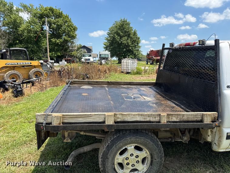 image for item EX2111 1999 Chevrolet Silverado 1500 Ext. Cab flatbed pickup truck