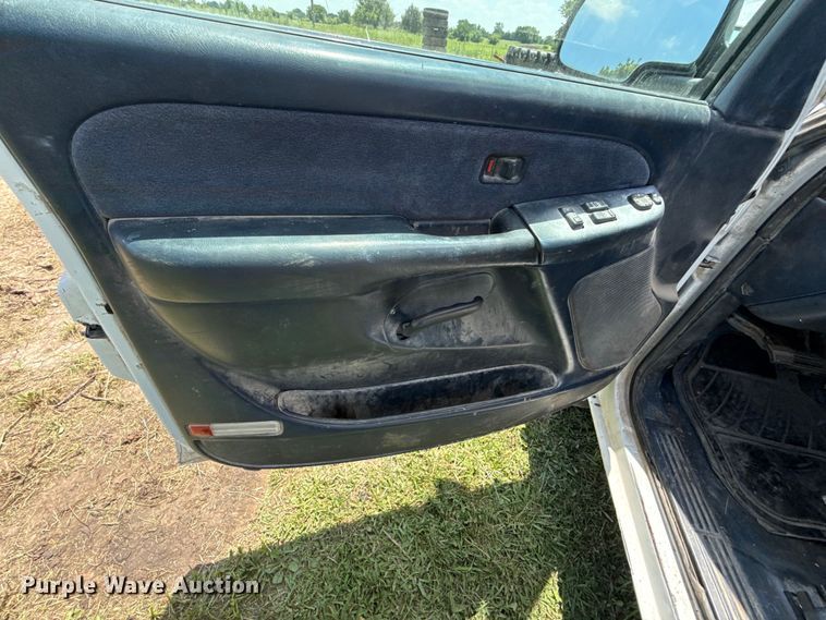 image for item EX2111 1999 Chevrolet Silverado 1500 Ext. Cab flatbed pickup truck