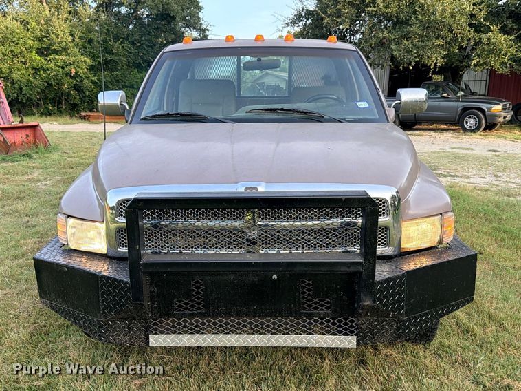 image for item FB8282 1997 Dodge Ram 3500 Ext. Cab flatbed pickup truck