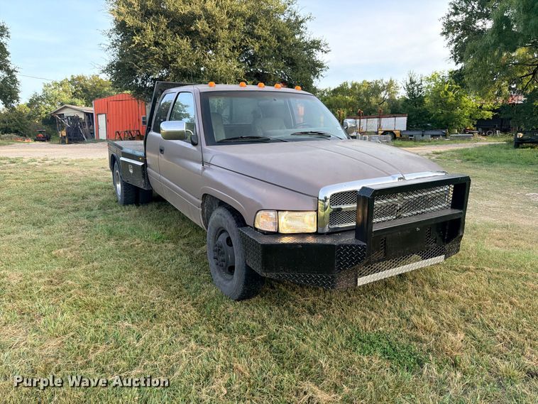 image for item FB8282 1997 Dodge Ram 3500 Ext. Cab flatbed pickup truck