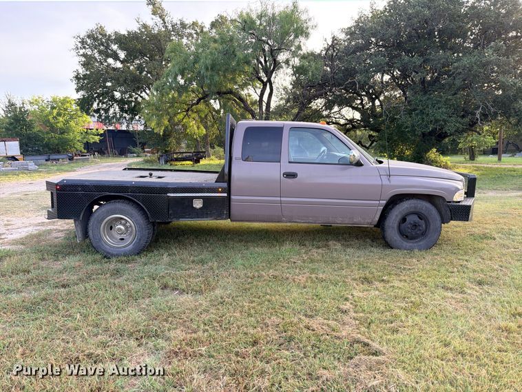 image for item FB8282 1997 Dodge Ram 3500 Ext. Cab flatbed pickup truck