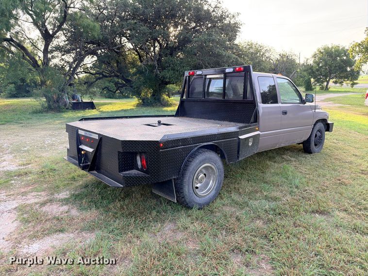 image for item FB8282 1997 Dodge Ram 3500 Ext. Cab flatbed pickup truck