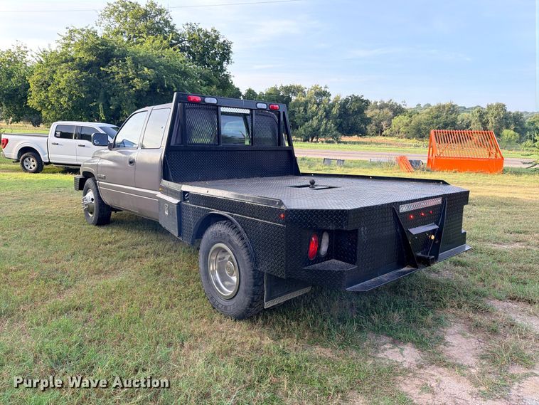 image for item FB8282 1997 Dodge Ram 3500 Ext. Cab flatbed pickup truck