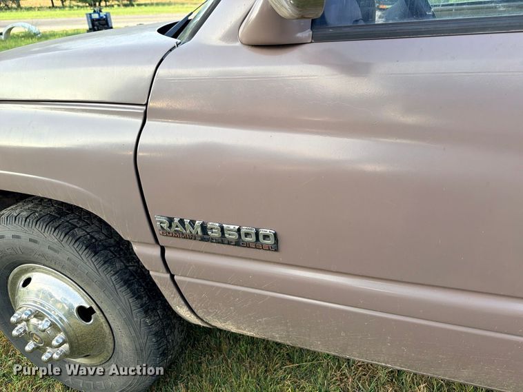 image for item FB8282 1997 Dodge Ram 3500 Ext. Cab flatbed pickup truck