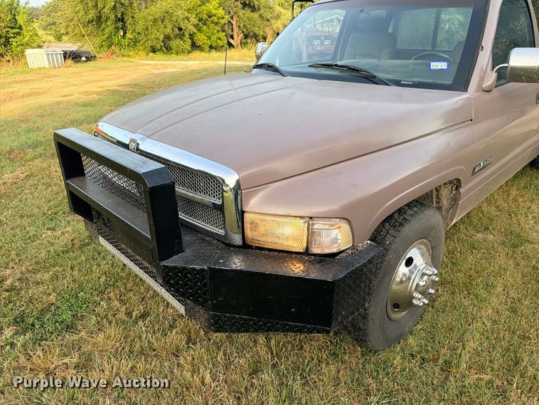 image for item FB8282 1997 Dodge Ram 3500 Ext. Cab flatbed pickup truck