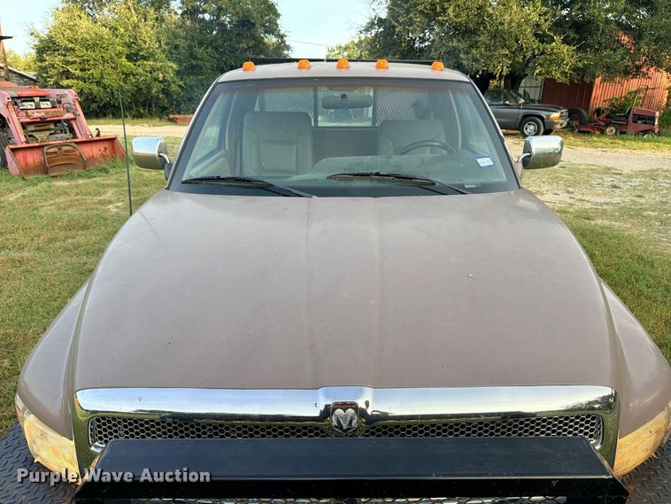 image for item FB8282 1997 Dodge Ram 3500 Ext. Cab flatbed pickup truck