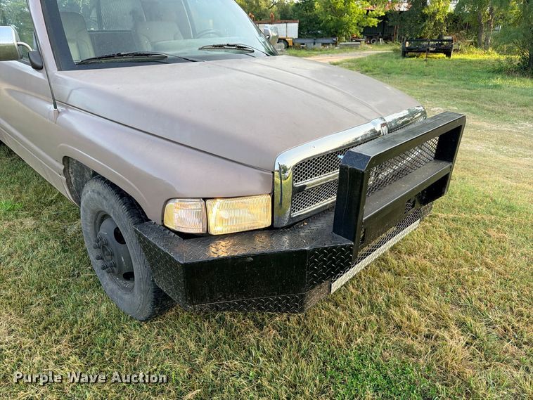 image for item FB8282 1997 Dodge Ram 3500 Ext. Cab flatbed pickup truck