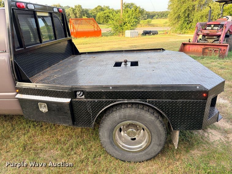 image for item FB8282 1997 Dodge Ram 3500 Ext. Cab flatbed pickup truck