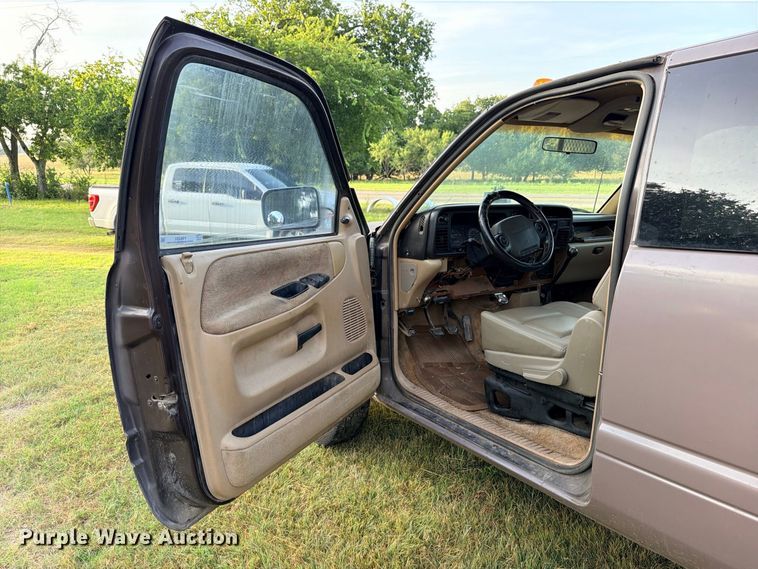 image for item FB8282 1997 Dodge Ram 3500 Ext. Cab flatbed pickup truck