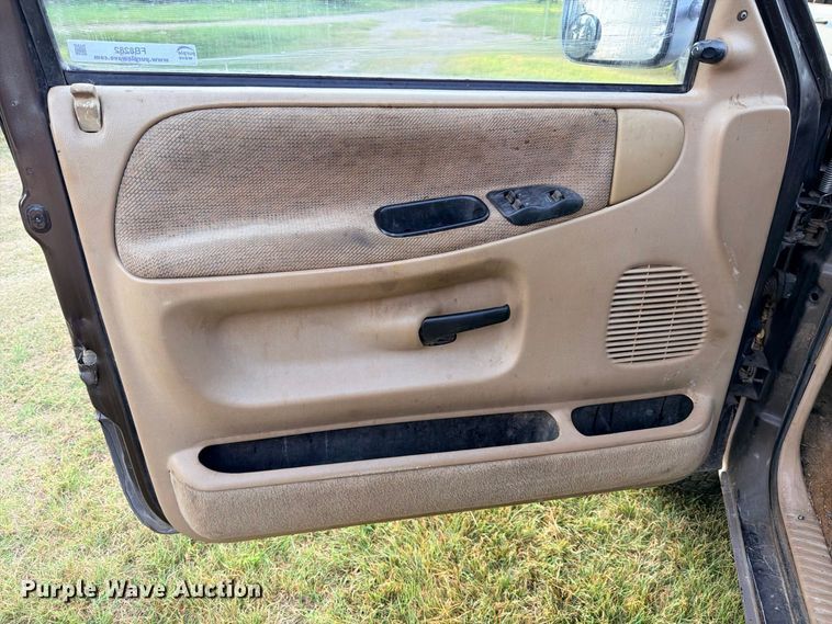 image for item FB8282 1997 Dodge Ram 3500 Ext. Cab flatbed pickup truck