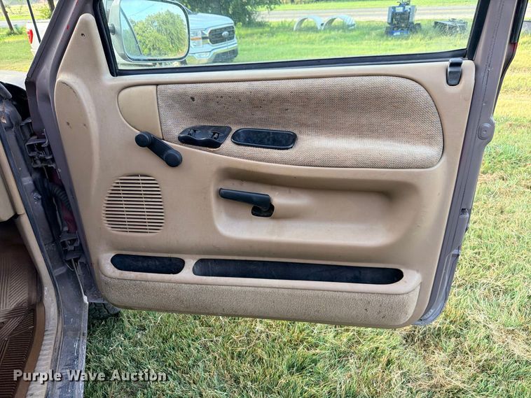 image for item FB8282 1997 Dodge Ram 3500 Ext. Cab flatbed pickup truck