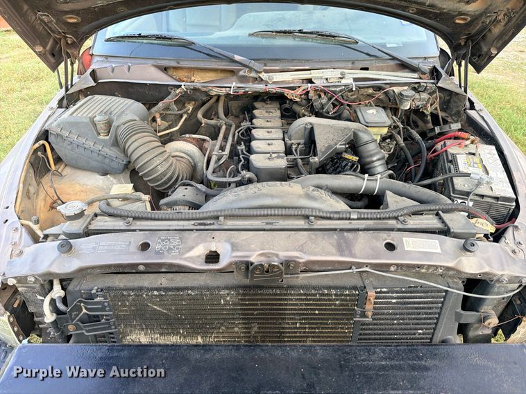 image for item FB8282 1997 Dodge Ram 3500 Ext. Cab flatbed pickup truck