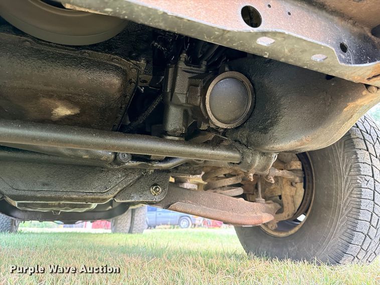 image for item FB8282 1997 Dodge Ram 3500 Ext. Cab flatbed pickup truck