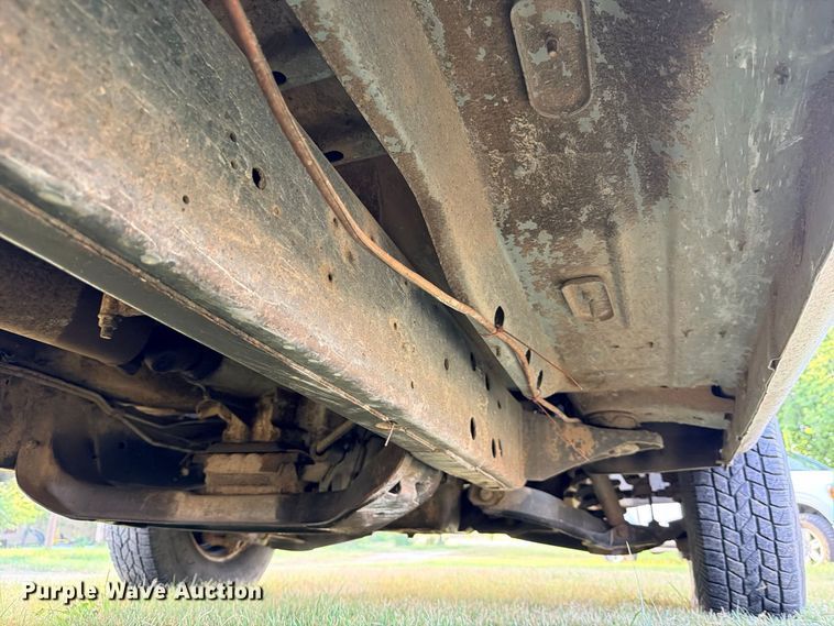image for item FB8282 1997 Dodge Ram 3500 Ext. Cab flatbed pickup truck