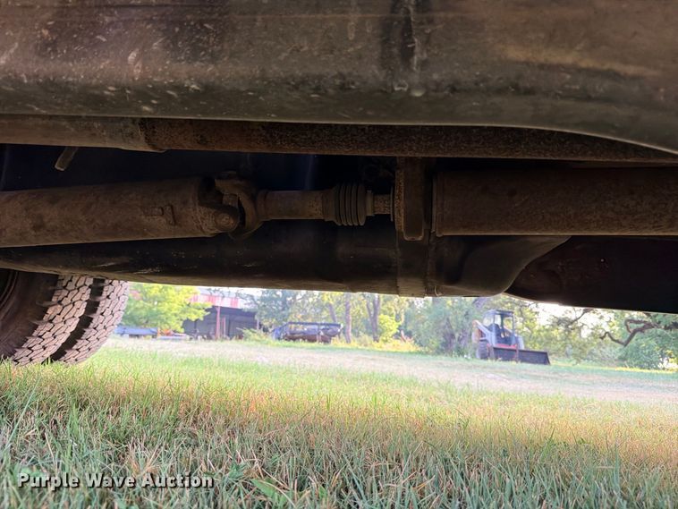 image for item FB8282 1997 Dodge Ram 3500 Ext. Cab flatbed pickup truck