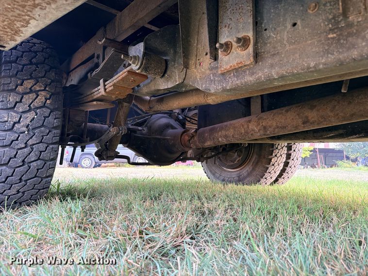 image for item FB8282 1997 Dodge Ram 3500 Ext. Cab flatbed pickup truck