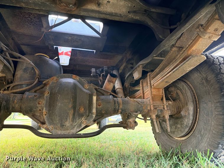 image for item FB8282 1997 Dodge Ram 3500 Ext. Cab flatbed pickup truck