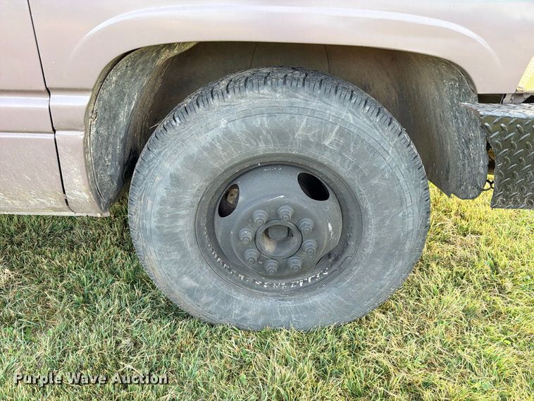 image for item FB8282 1997 Dodge Ram 3500 Ext. Cab flatbed pickup truck