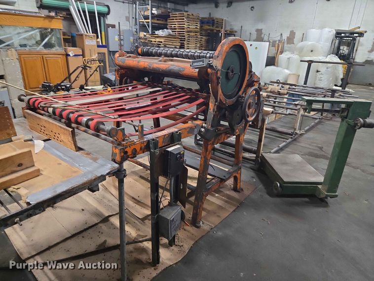 image for item FC0975  News paper machine and scale