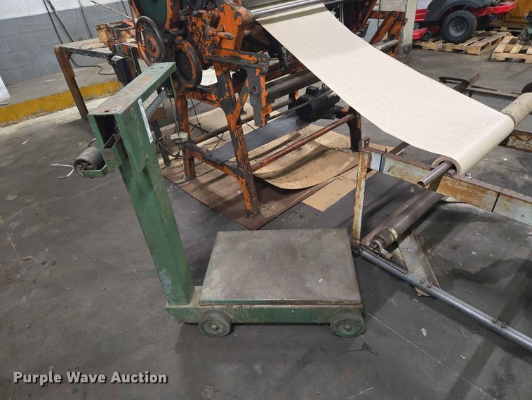 image for item FC0975  News paper machine and scale