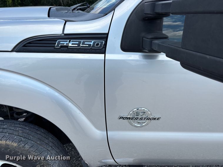 image for item FG0528 2016 Ford F350 Super Duty Crew Cab flatbed pickup truck