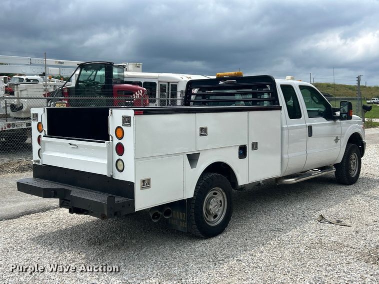 image for item FT6015 2015 Ford F350 Super Duty Ext. Cab utility bed pickup truck