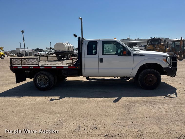 image for item NJ9248 2014 Ford F350  Super Duty XL Ext. Cab dump flatbed pickup truck