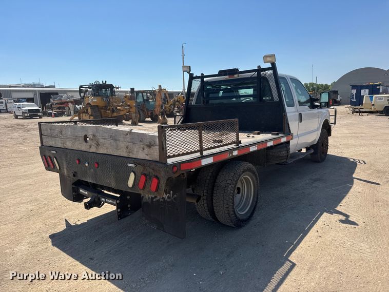 image for item NJ9248 2014 Ford F350  Super Duty XL Ext. Cab dump flatbed pickup truck
