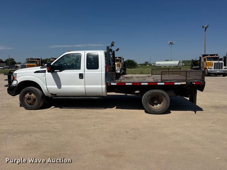 image for item NJ9248 2014 Ford F350  Super Duty XL Ext. Cab dump flatbed pickup truck