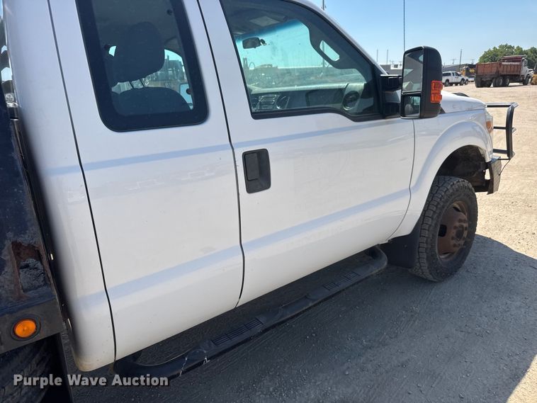image for item NJ9248 2014 Ford F350  Super Duty XL Ext. Cab dump flatbed pickup truck