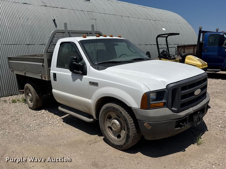 image for item NJ9250 2005 Ford F350 Super Duty XL dump flatbed pickup truck
