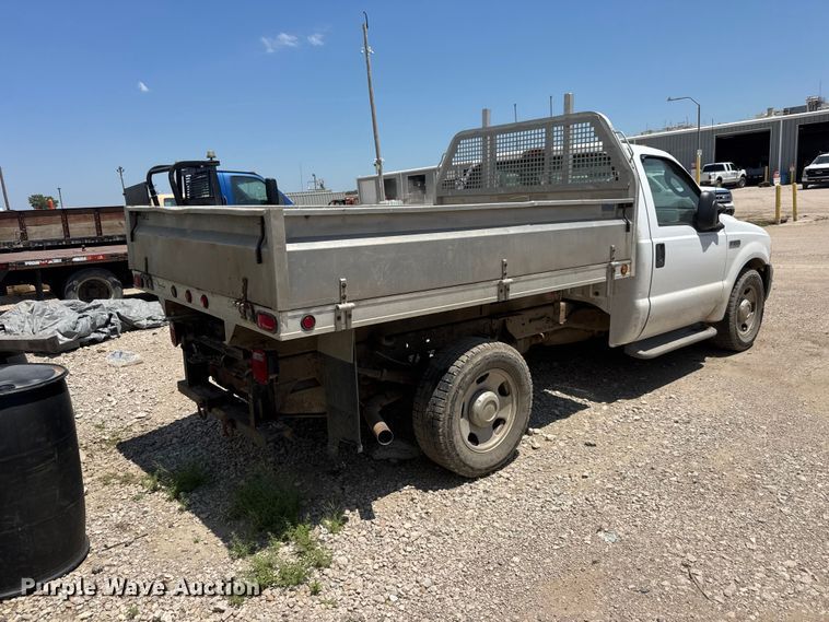 image for item NJ9250 2005 Ford F350 Super Duty XL dump flatbed pickup truck