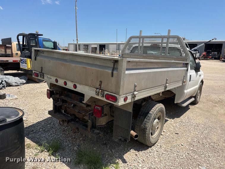 image for item NJ9250 2005 Ford F350 Super Duty XL dump flatbed pickup truck
