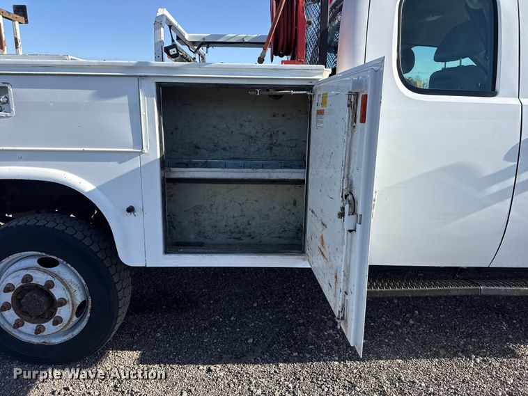 image for item EG8883 2013 Chevrolet 3500HD Ext. Cab utility bed pickup truck