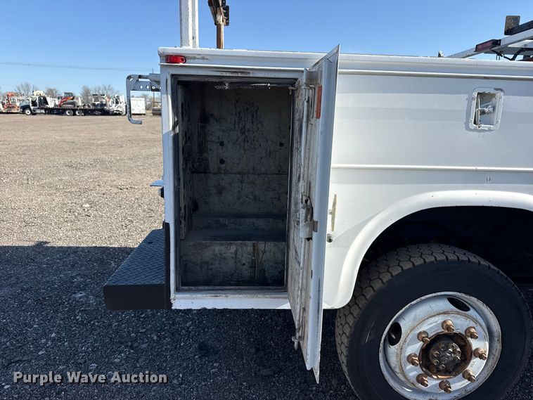 image for item EG8883 2013 Chevrolet 3500HD Ext. Cab utility bed pickup truck