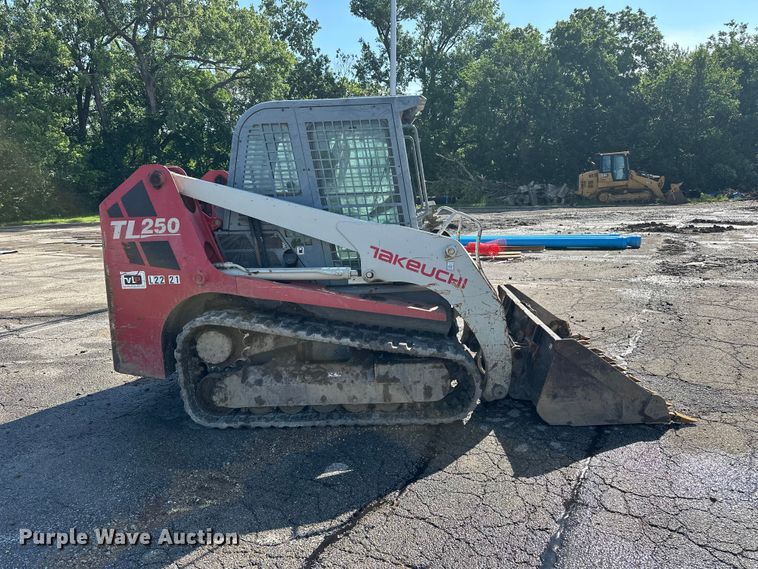 image for item ES6504 2012 Takeuchi TL250 tracked skid steer loader
