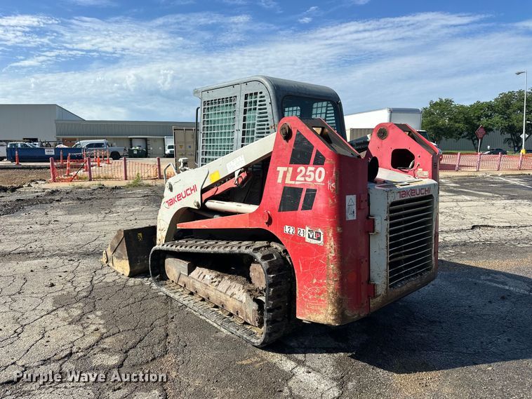 image for item ES6504 2012 Takeuchi TL250 tracked skid steer loader