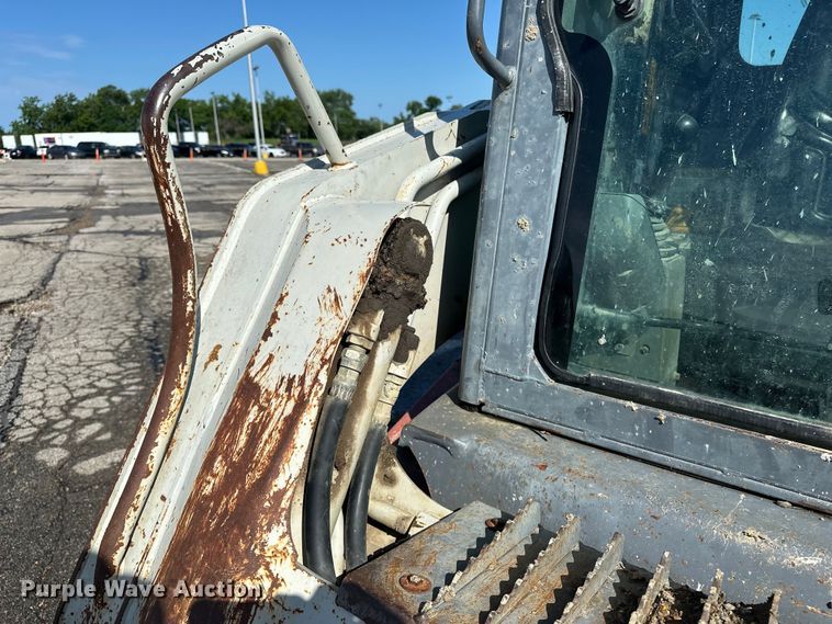 image for item ES6504 2012 Takeuchi TL250 tracked skid steer loader